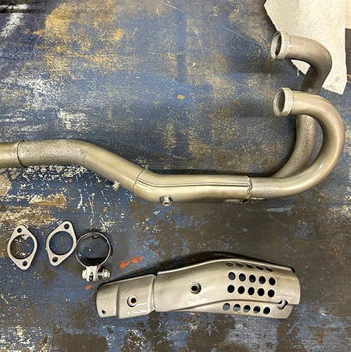 gallery4 A sand blasted motorcycle exhaust and parts